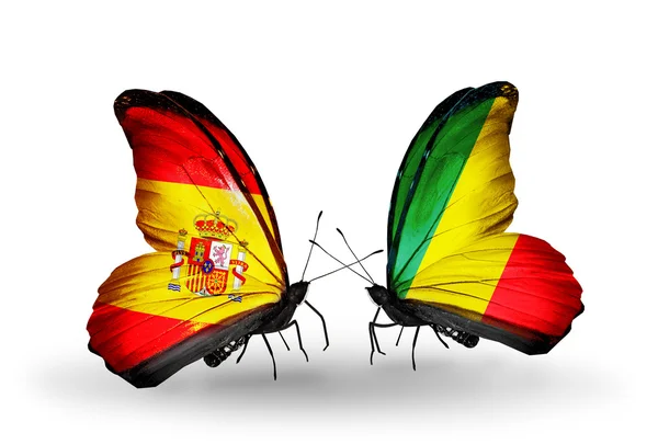 Papillons avec des drapeaux d'Espagne et de Kongo sur les ailes — Photo