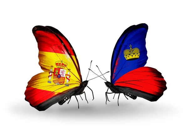 Mariposas con banderas de España y Liechtenstein en alas — Foto de Stock