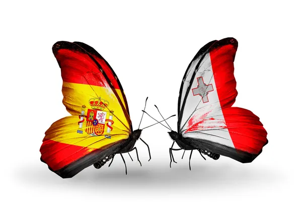 Mariposas con banderas de España y Malta en alas —  Fotos de Stock