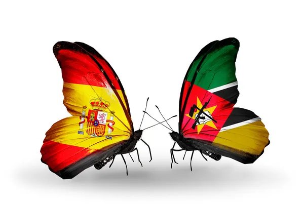 Mariposas con banderas de España y Mozambique en alas — Foto de Stock