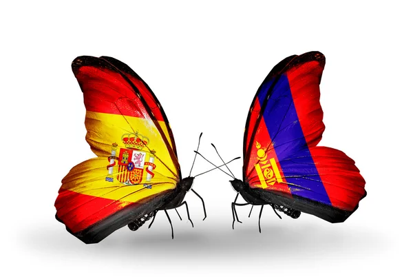 Mariposas con banderas de España y Mongolia en alas — Foto de Stock