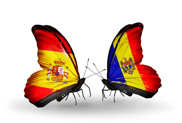 Mariposas con banderas de España y Moldavia en alas — Foto de Stock