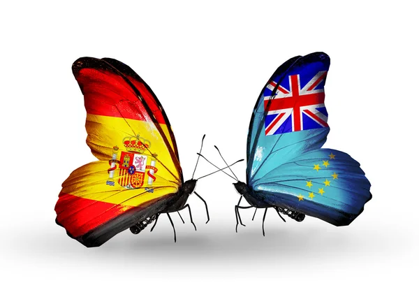 Mariposas con banderas de España y Tuvalu en alas — Foto de Stock