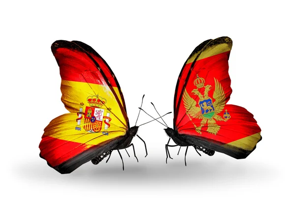 Mariposas con banderas de España y Montenegro en alas — Foto de Stock