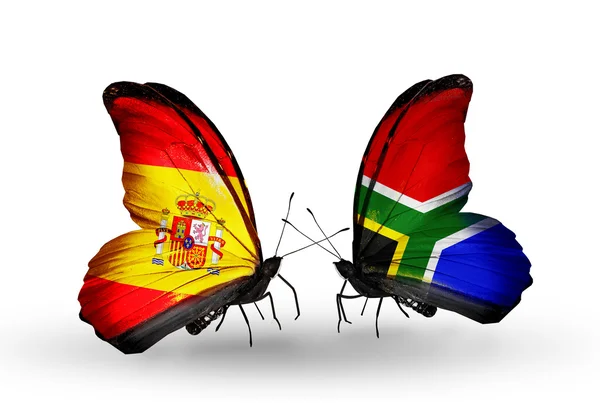 Farfalle con bandiere Spagna e Sudafrica sulle ali — Foto Stock