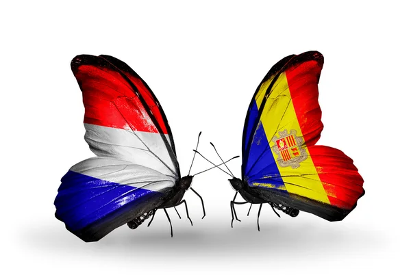 Butterflies with Holland and Andorra flags on wings — Stock Photo, Image