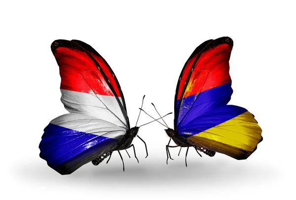 Borboletas com bandeiras Holland e Armenia em asas — Fotografia de Stock