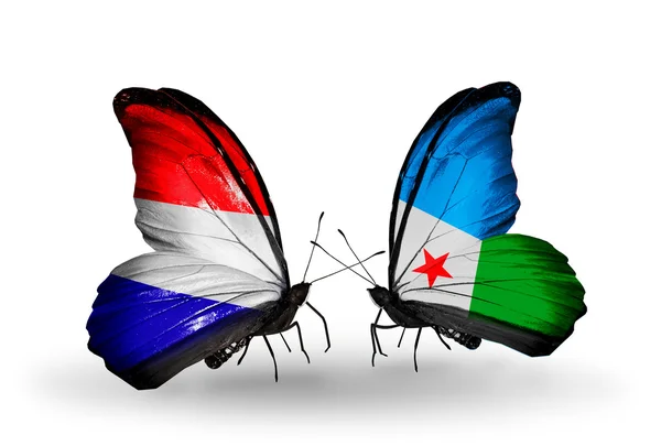 Butterflies with Holland and Djibouti flags on wings — Stock Photo, Image