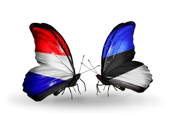 Farfalle con bandiere Olanda ed Estonia su ali — Foto Stock