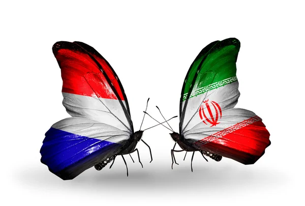Farfalle con le bandiere dell'Olanda e dell'Iran sulle ali — Foto Stock