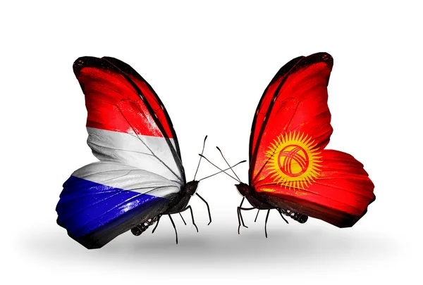 Butterflies with Holland and Kirghiz flags on wings — Stock Photo, Image