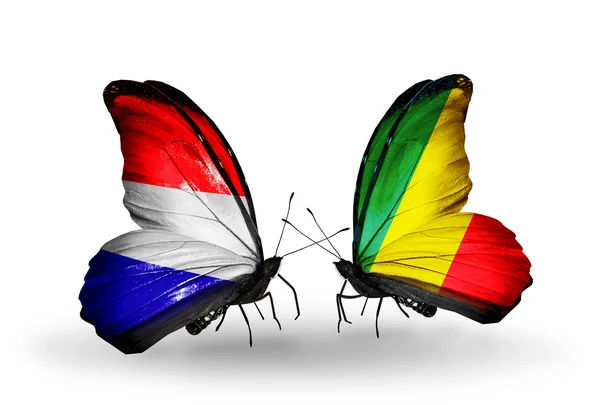 Mariposas con banderas de Holanda y Kongo en alas —  Fotos de Stock