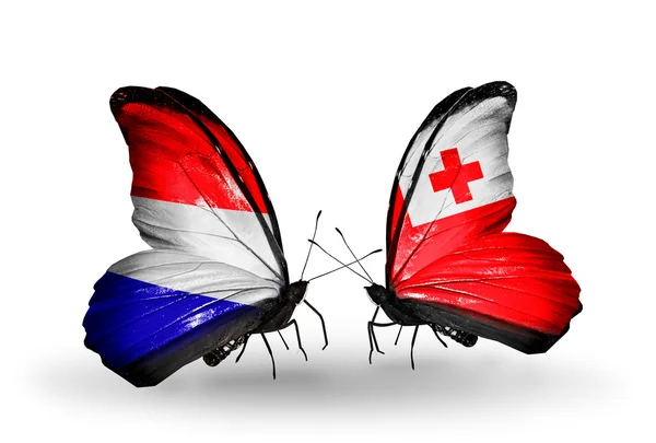 Farfalle con bandiere Olanda e Tonga sulle ali — Foto Stock