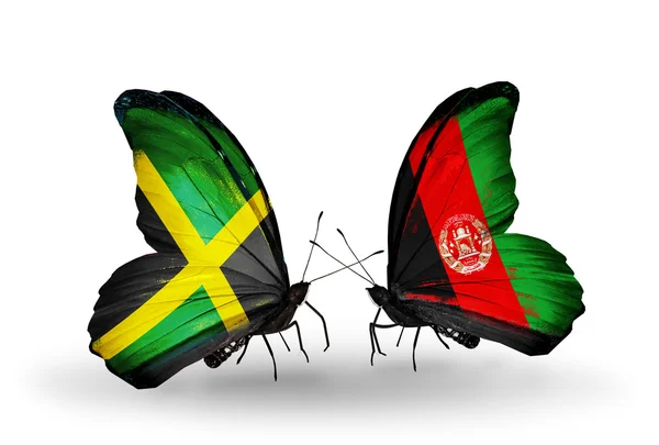 Butterflies with Jamaica and Afghanistan flags on wings — Stock Photo, Image