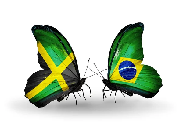 Motýli s příznaky Jamajky a Brazílie na křídlech — Stock fotografie