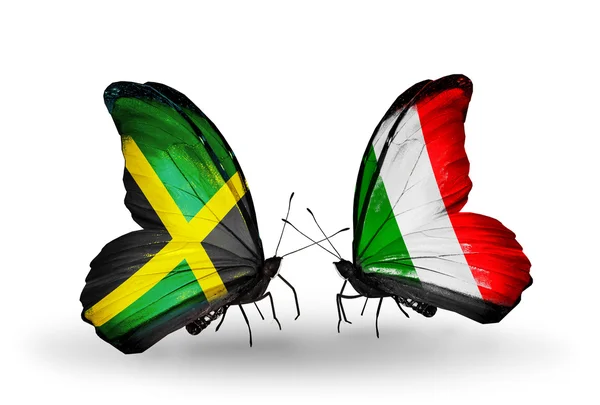 Butterflies with Jamaica and Italy flags on wings — Stock Photo, Image