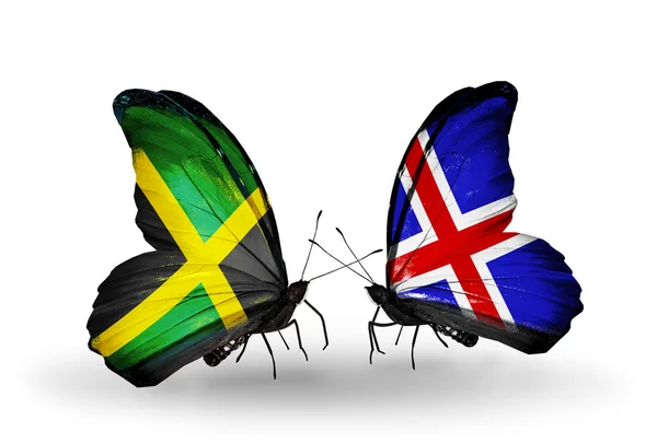 Butterflies with Jamaica and Iceland flags on wings — Stock Photo, Image