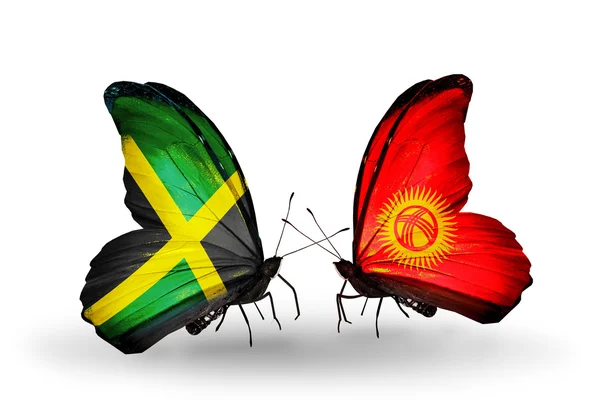 Butterflies with Jamaica and Kirghiz flags on wings — Stock Photo, Image