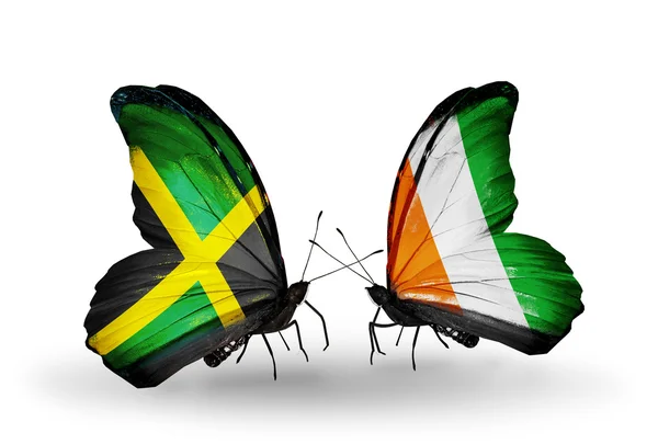 Papillons avec drapeaux Jamaïque et Côte Divoire sur les ailes — Photo