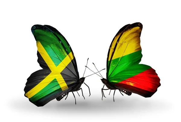Vlinders met jamaica en Litouwen vlaggen op vleugels — Stockfoto
