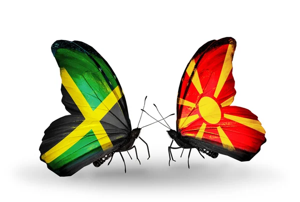 Butterflies with Jamaica and Macedonia flags on wings — Stock Photo, Image