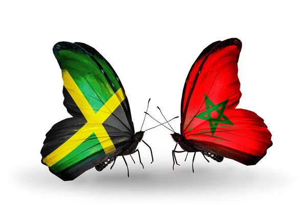 Бабочки с флагами Ямайки и Марокко на крыльях — стоковое фото