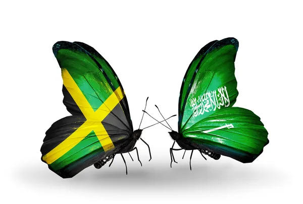 Papillons avec drapeaux Jamaïque et Arabie Saoudite sur les ailes — Photo