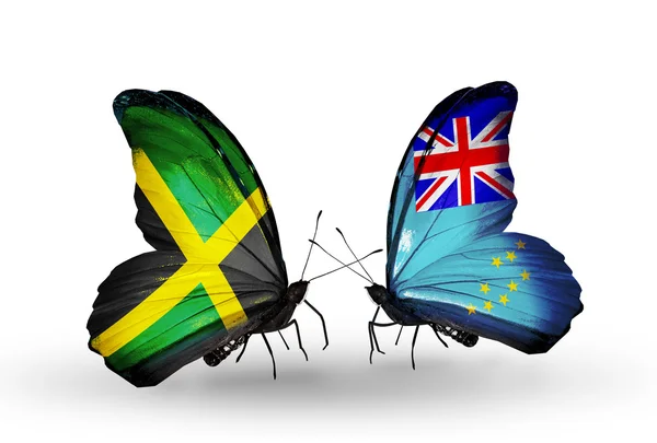 Motyle z flagami Jamajki i tuvalu na skrzydłach — Zdjęcie stockowe