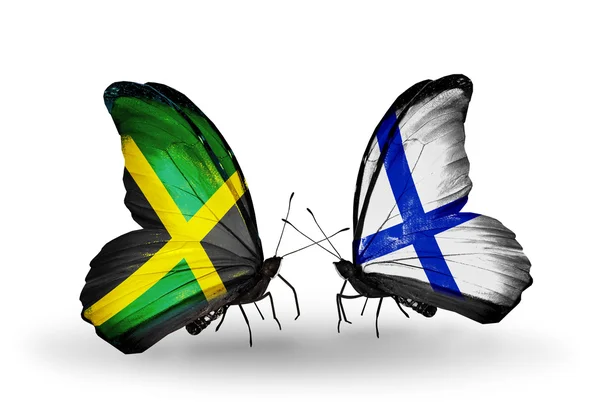 Mariposas con banderas de Jamaica y Finlandia en alas — Foto de Stock