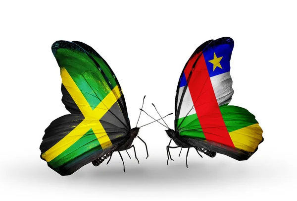Butterflies with Jamaica and CAR flags on wings — Stock Photo, Image