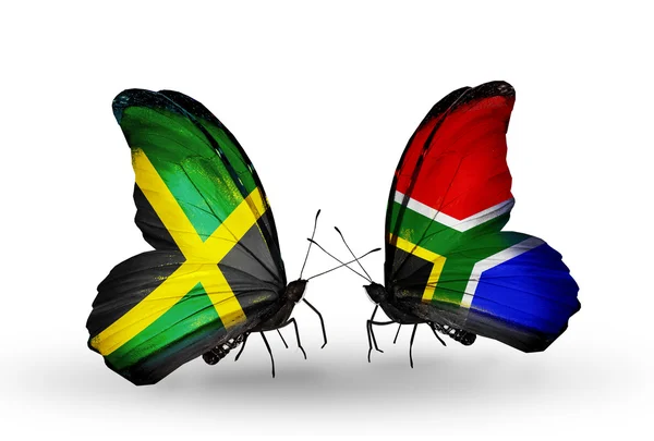 Butterflies with Jamaica and South Africa flags on wings — Stock Photo, Image