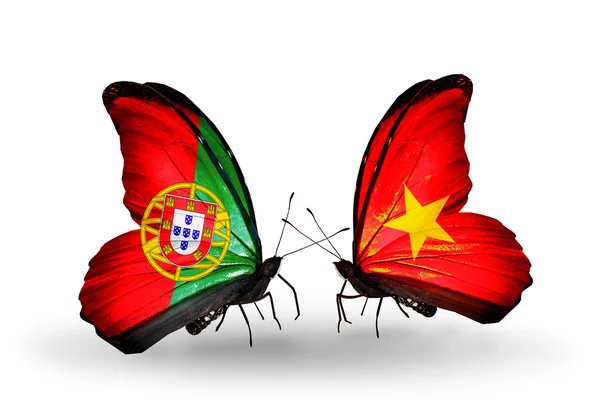 Borboletas com bandeiras de Portugal e Vietname em asas — Fotografia de Stock