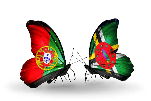 Papillons avec drapeaux Portugal et Dominique sur les ailes — Photo