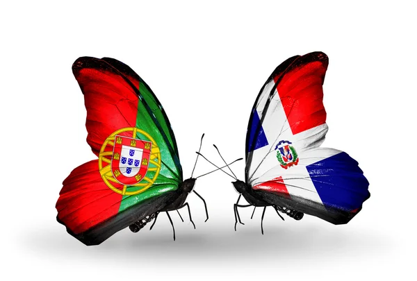 Butterflies with Portugal and Dominicana flags on wings — Stock Photo, Image