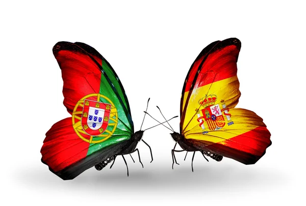 Butterflies with Portugal and Spain flags on wings — Stock Photo, Image