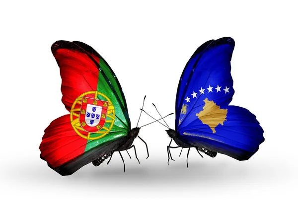 Butterflies with Portugal and Kosovo flags on wings — Stock Photo, Image