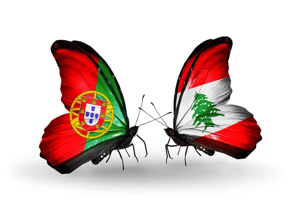 Butterflies with Portugal and Lebanon flags on wings — Stock Photo, Image