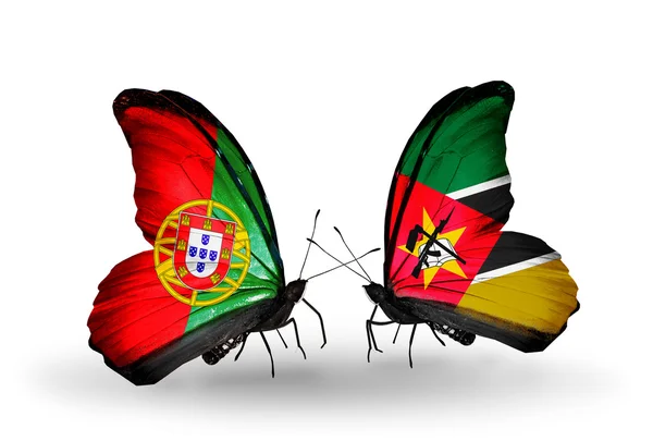 Butterflies with Portugal and Mozambique flags on wings — Stock Photo, Image