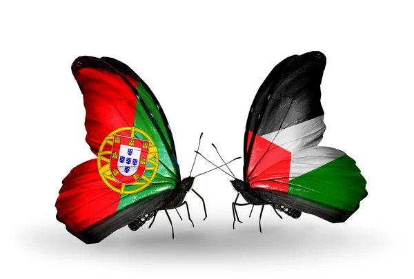 Motýli s Portugalskem a Palestině příznaky na křídlech — Stock fotografie