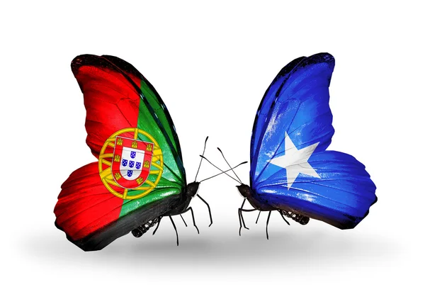 Mariposas con banderas de Portugal y Somalia en alas — Foto de Stock