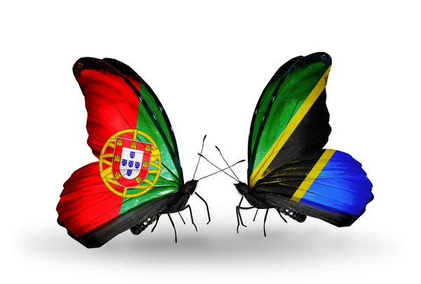 Fjärilar med portugal och tanzania flaggor på vingar — Stockfoto