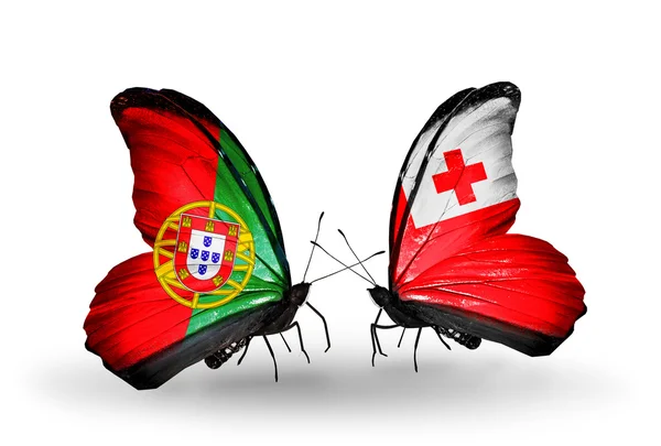 Butterflies with Portugal and Tonga flags on wings — Stock Photo, Image