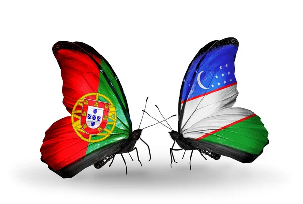Butterflies with Portugal and Uzbekistan flags on wings — Stock Photo, Image