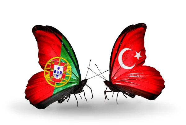 Motyle z Portugalii i Turcji flagi na skrzydłach — Zdjęcie stockowe