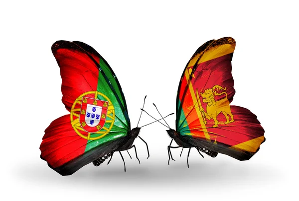 Butterflies with Portugal and Sri Lanka flags on wings — Stock Photo, Image