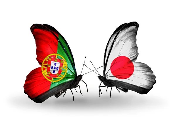 Motyle z Portugalii i Japonii flagi na skrzydłach — Zdjęcie stockowe