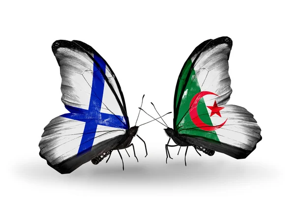 Vlinders met finland en Algerije vlaggen op vleugels — Stockfoto