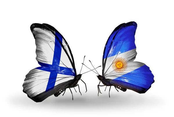 Butterflies with Finland and Argentina flags on wings — Stock Photo, Image