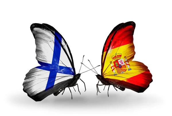 Butterflies with Finland and Spain flags on wings — Stock Photo, Image