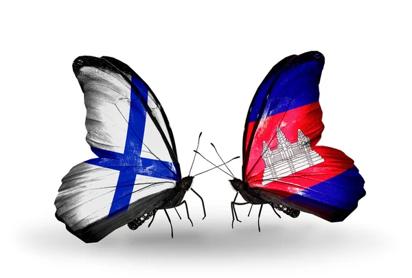 Schmetterlinge mit Finnland und Kambodscha-Flaggen auf Flügeln — Stockfoto